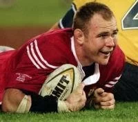 Roaring success: Quinnell crosses the line during the Lions' first Test against Australia in 2001